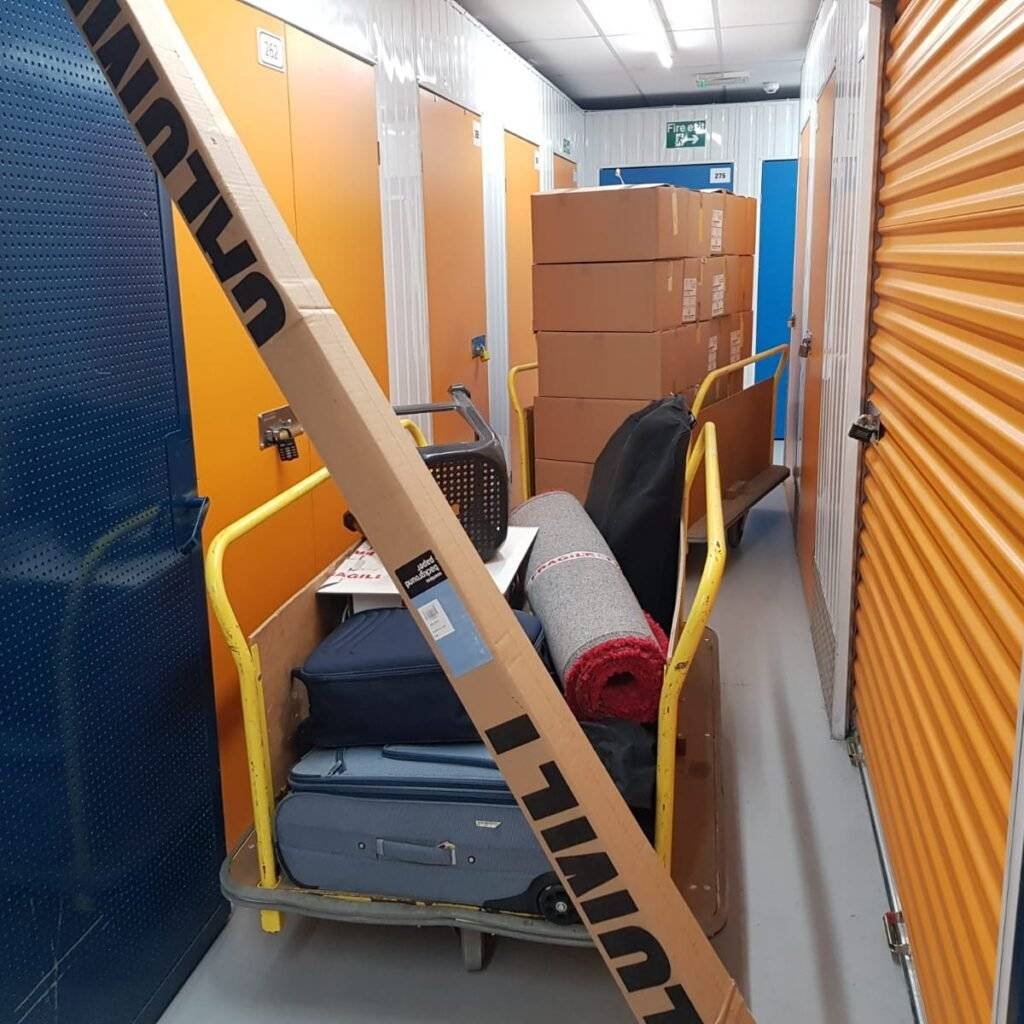 This is a pic of luggage in the trolley outside the storage unit